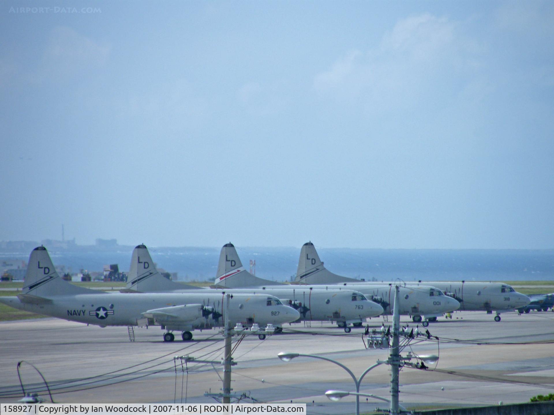 158927, Lockheed P-3C-145-LO Orion C/N 285A-5599, Lockheed P-3C-IIIR (Heads a line of P-3's on the ramp at Kadena)