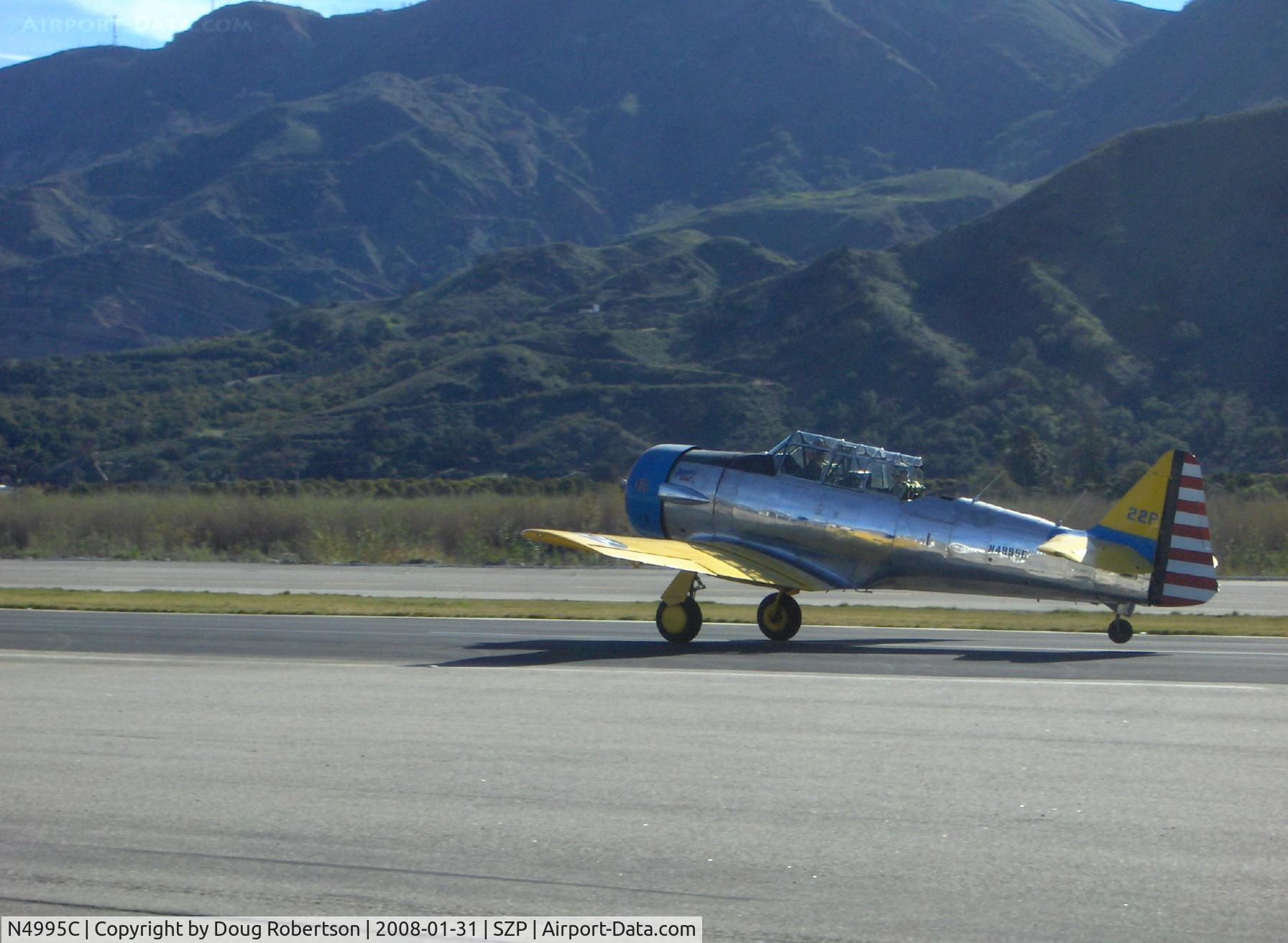 N4995C, 1949 North American T-6G Texan C/N 168-481, 1949 North American T-6G TEXAN 'Thirsty Girl', P&W R-1340 600 Hp, takeoff roll Rwy 04