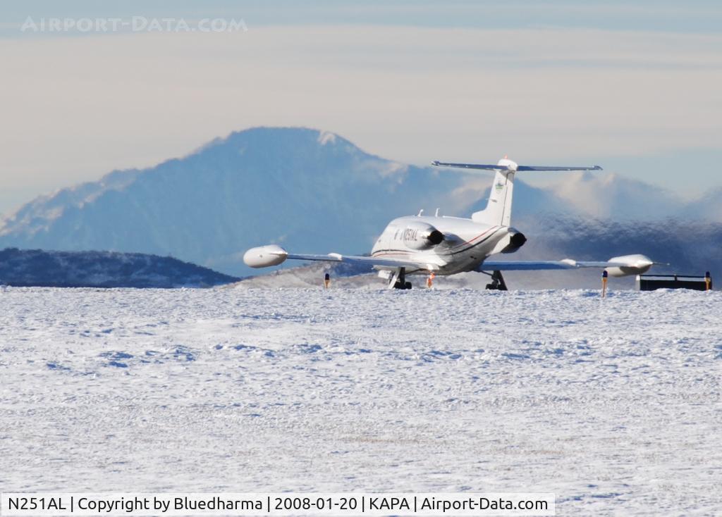 N251AL, Gates Learjet 25D C/N 25D-313, Airlife Denver. Takeoff on 17L. Pikes Peak in the distance.