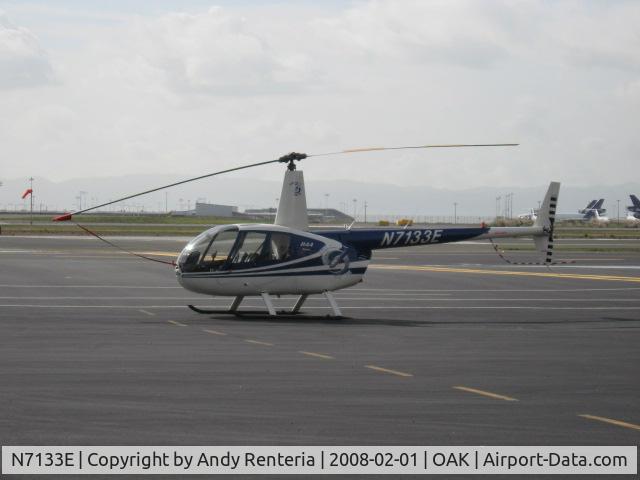 N7133E, 1999 Robinson R44 C/N 0573, Photographed at Oakland's historic North Field.