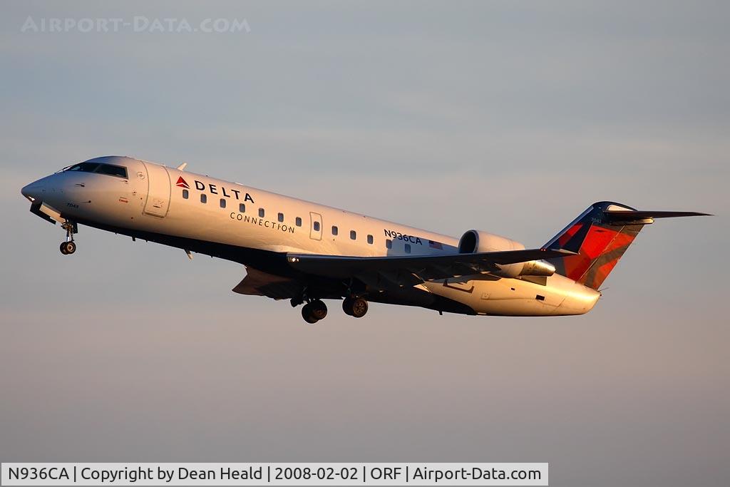 N936CA, 1994 Canadair CRJ-100ER (CL-600-2B19) C/N 7043, Delta Connection (by Comair) N936CA (FLT COM667) climbing out from RWY 5 enroute to Cincinnati Northern Kentucky Int'l (KCVG).