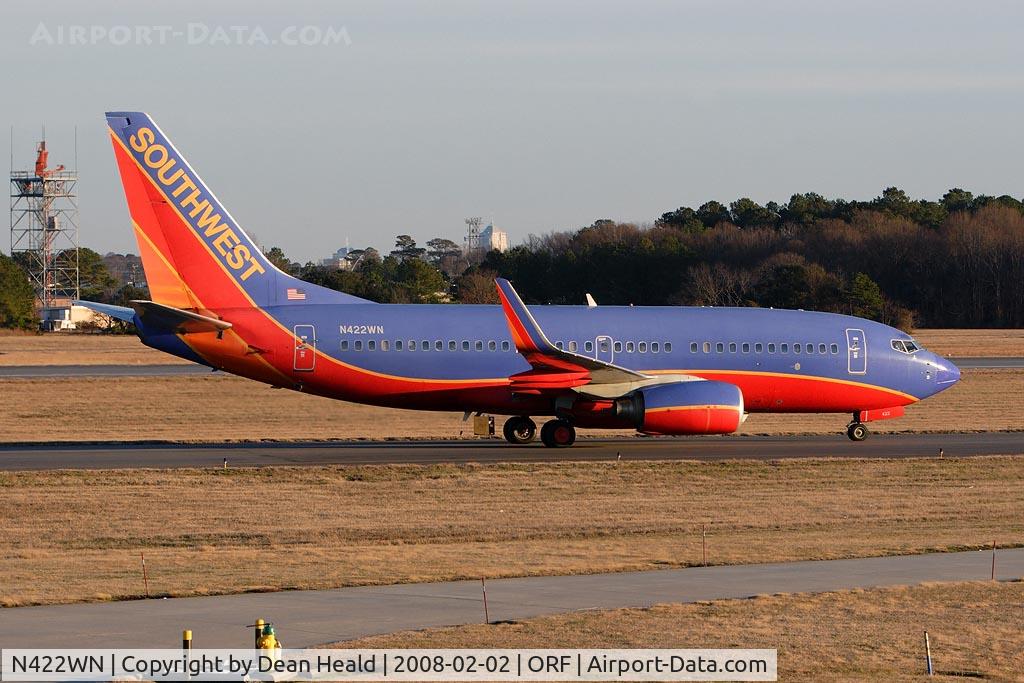 N422WN, 2002 Boeing 737-7H4 C/N 29826, Southwest Airlines N422WN (FLT SWA591) from Chicago Midway Int'l (KMDW) taxiing to the gate via Taxiway Charlie.
