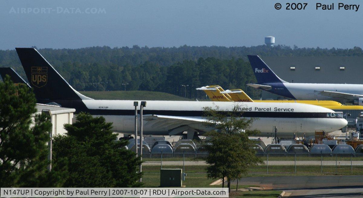 N147UP, 2003 Airbus A300F4-622R C/N 830, Amidst a packed cargo ramp