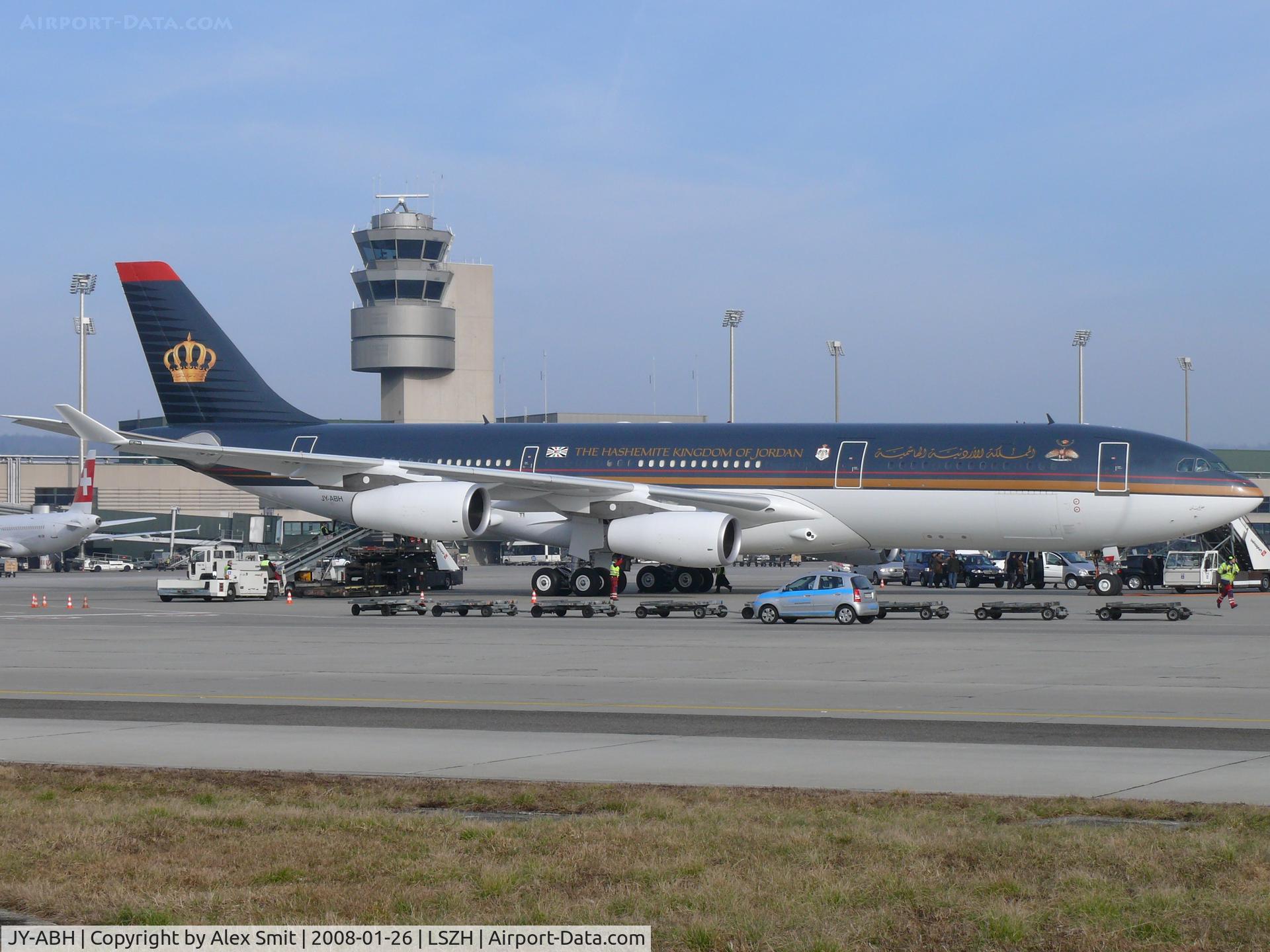 JY-ABH, 1993 Airbus A340-211 C/N 009, Parked under the watchfull of Zürich tower