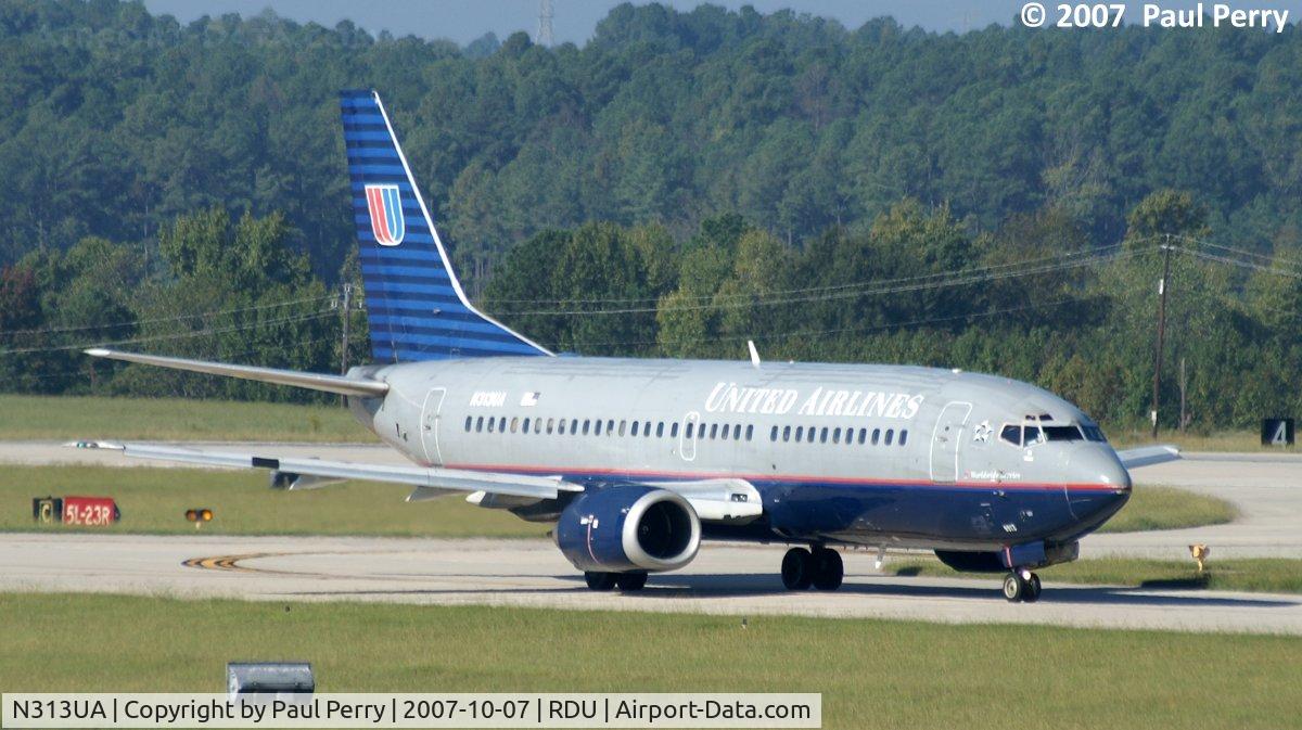 N313UA, 1987 Boeing 737-322 C/N 23674, Taxiing out for her flight