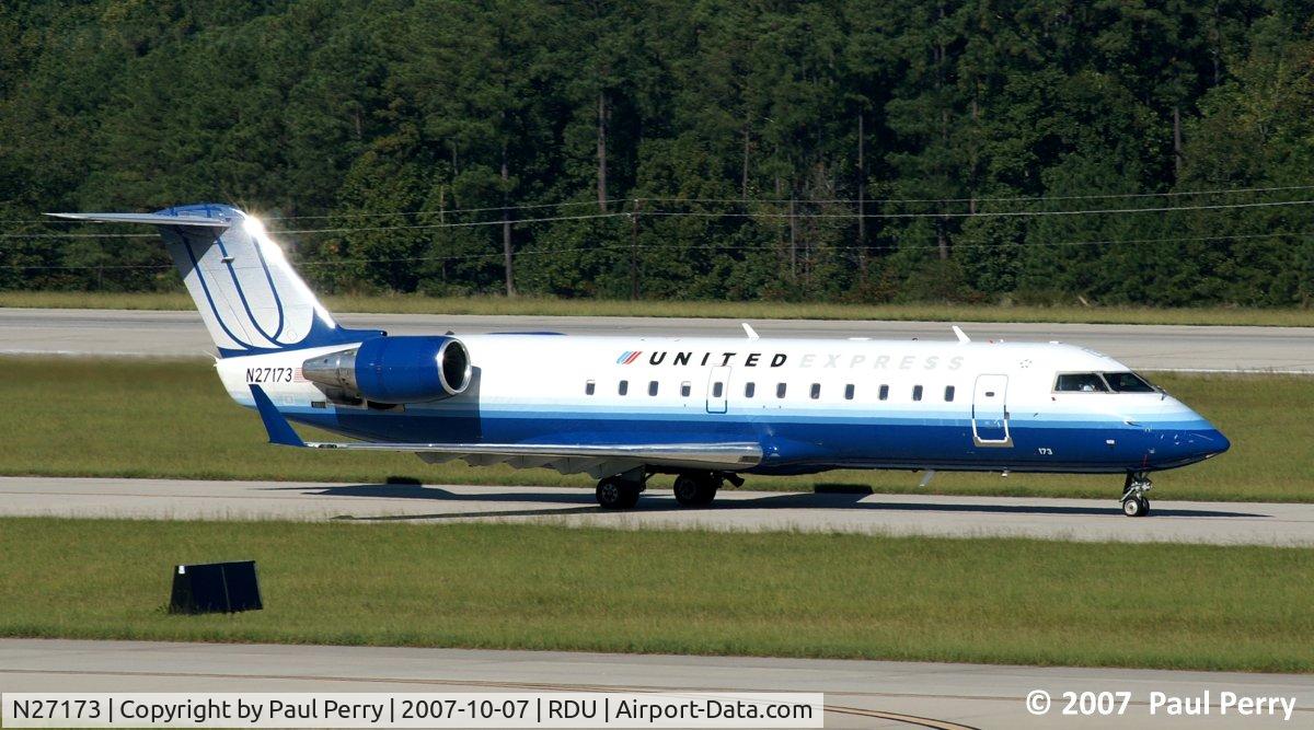 N27173, 1997 Canadair CRJ-200LR (CL-600-2B19) C/N 7173, Catching some sun on the polshed metal
