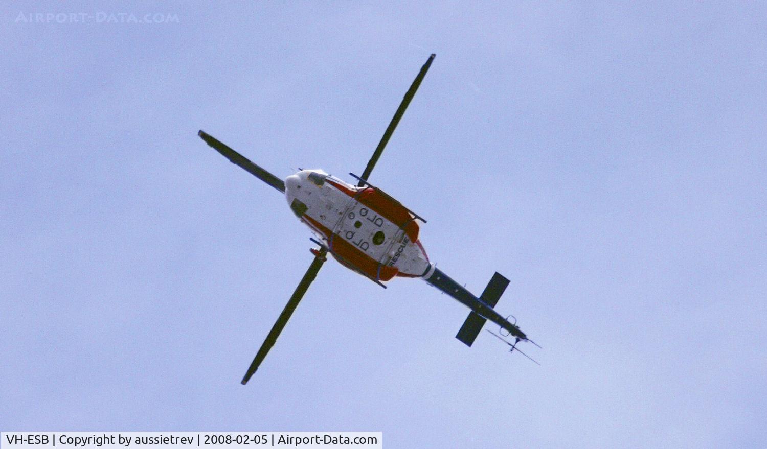 VH-ESB, 1994 Bell 412EP C/N 36087, On duty over the Gold Coast during widespread flooding