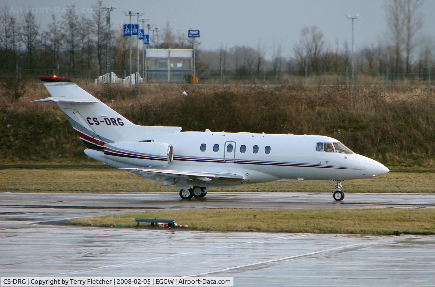CS-DRG, 2005 Raytheon Hawker 800XP C/N 258741, Netjets Hawker 800XP taxies out at Luton in Feb 2008