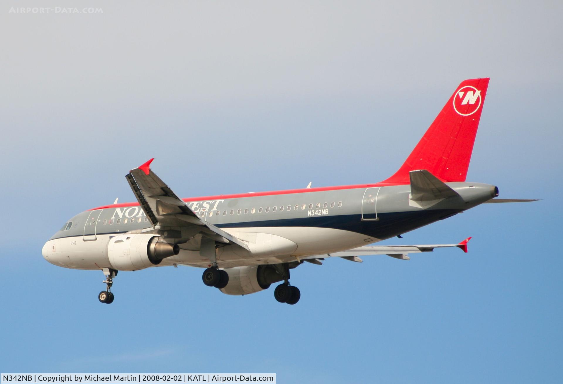 N342NB, 2002 Airbus A319-114 C/N 1746, Over the numbers of 26R
