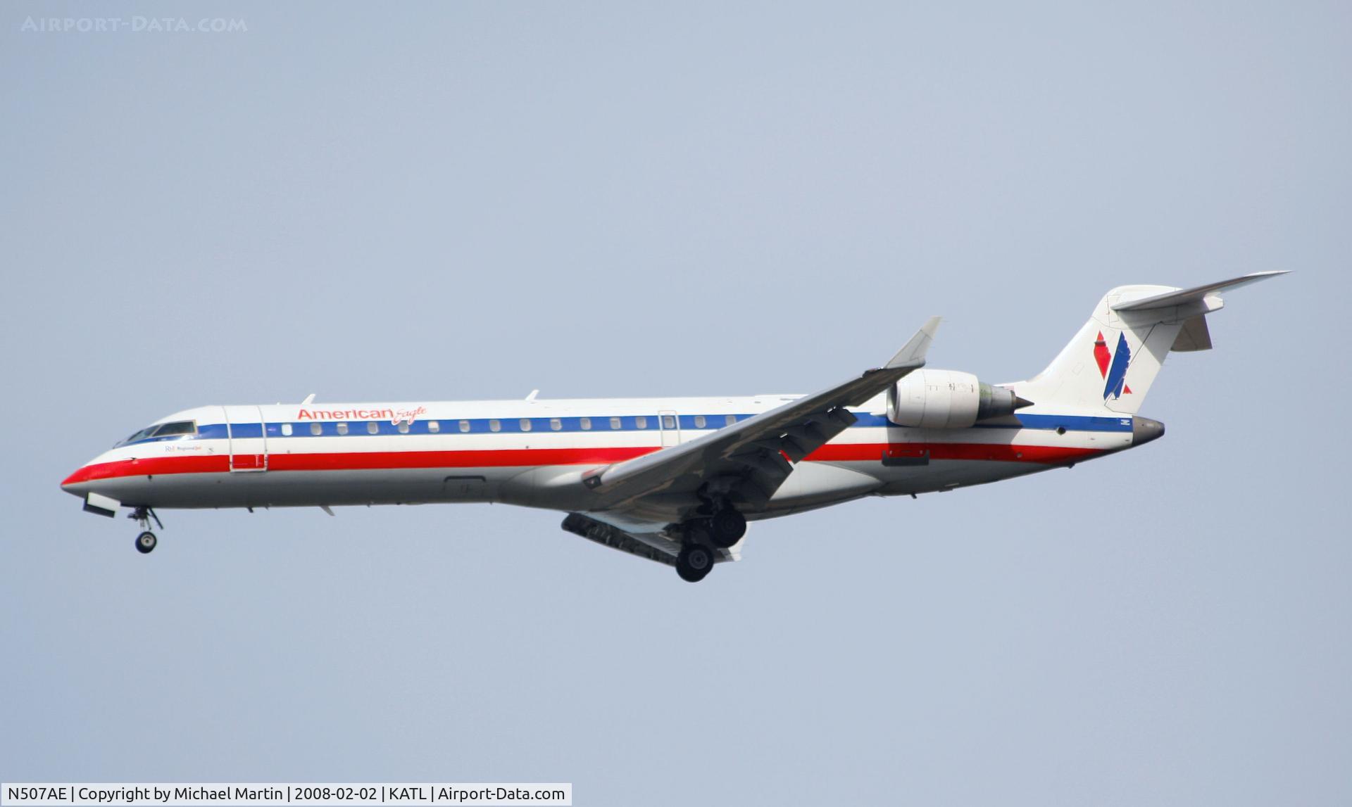 N507AE, 2002 Bombardier CRJ-701 (CL-600-2C10) Regional Jet C/N 10059, On final for Runway 26R