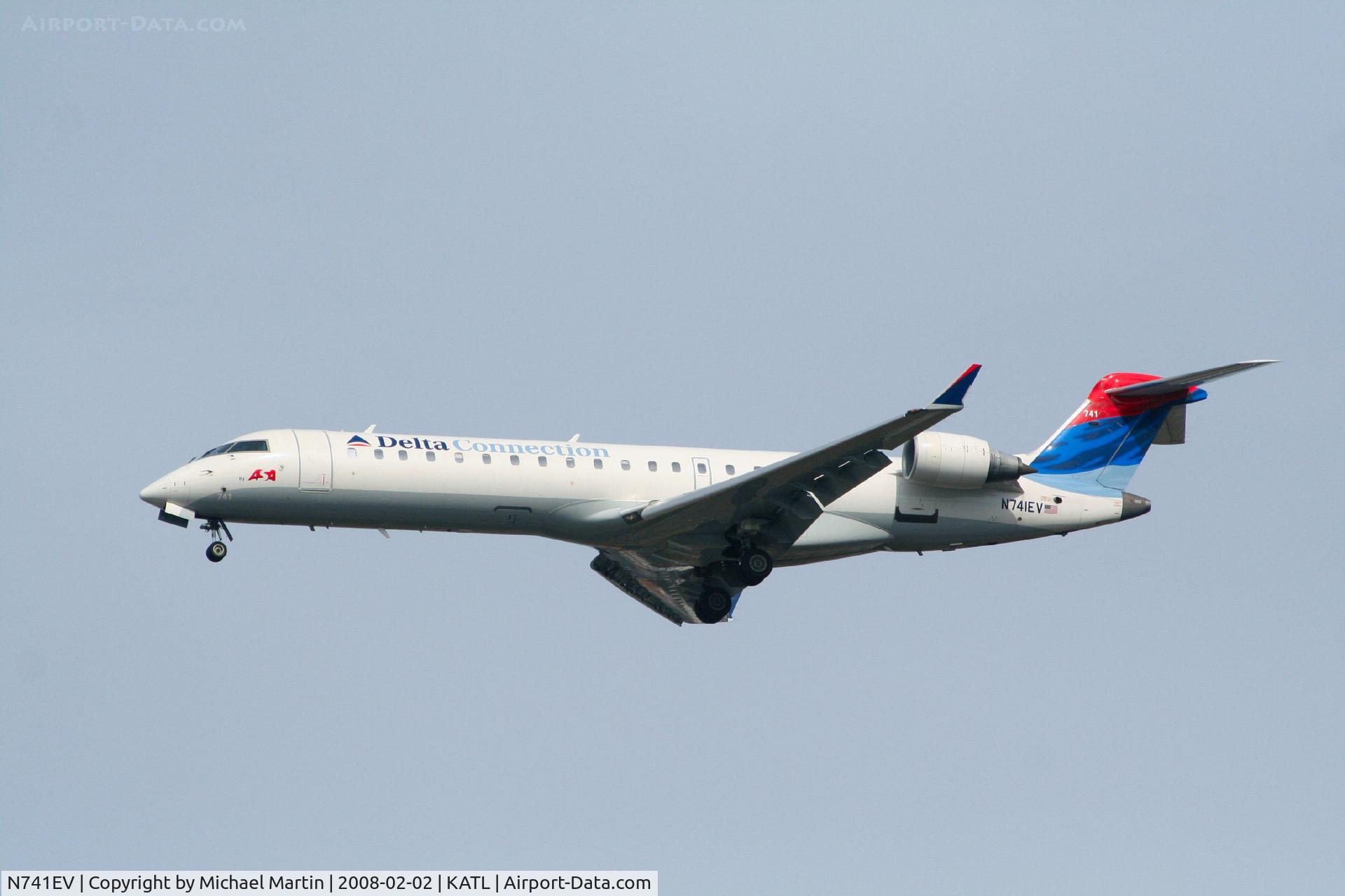N741EV, 2004 Bombardier CRJ-701ER (CL-600-2C10) Regional Jet C/N 10155, On final for Runway 26R