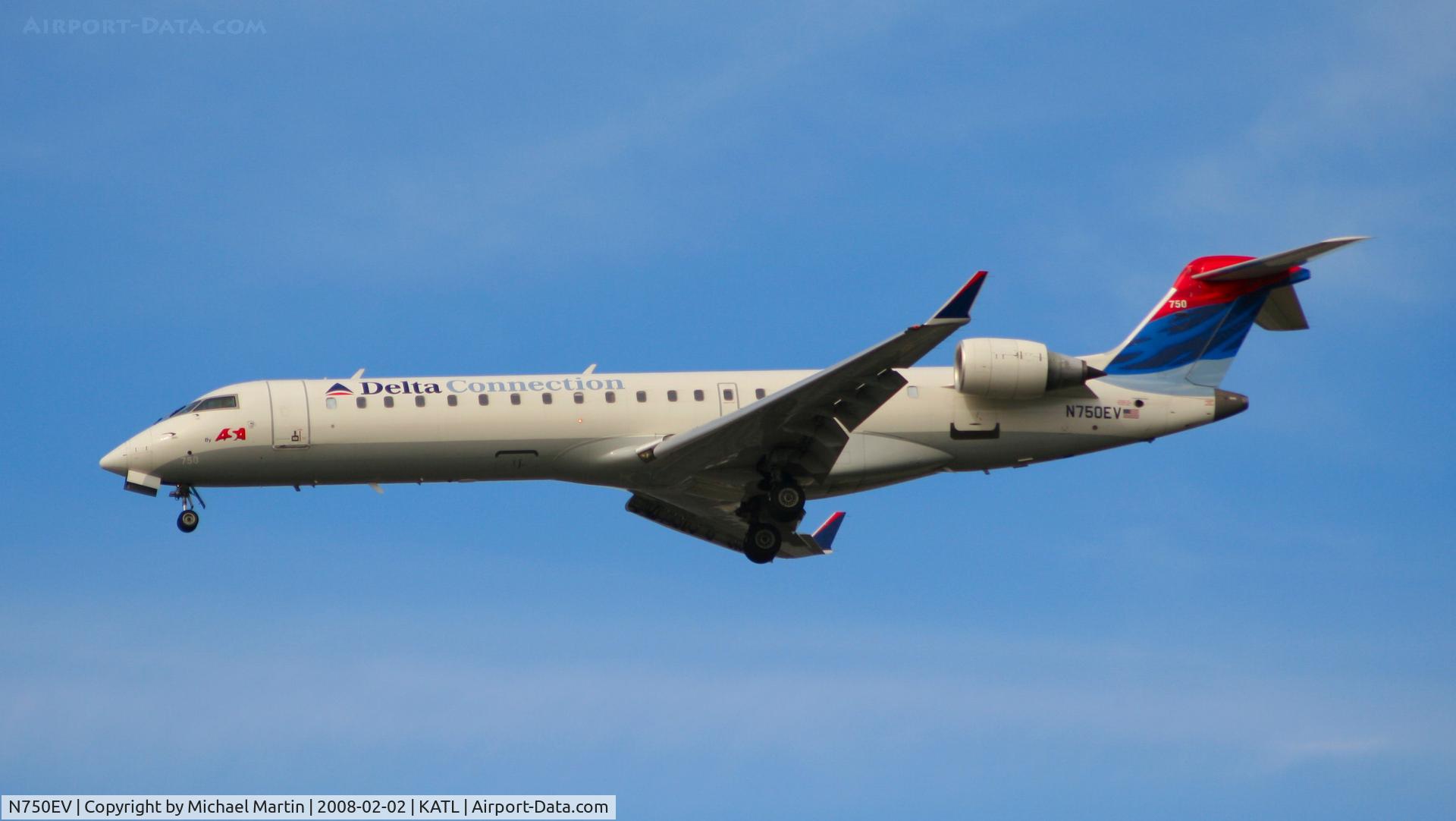 N750EV, 2004 Bombardier CRJ-701 (CL-600-2C10) Regional Jet C/N 10161, On final for Runway 26R