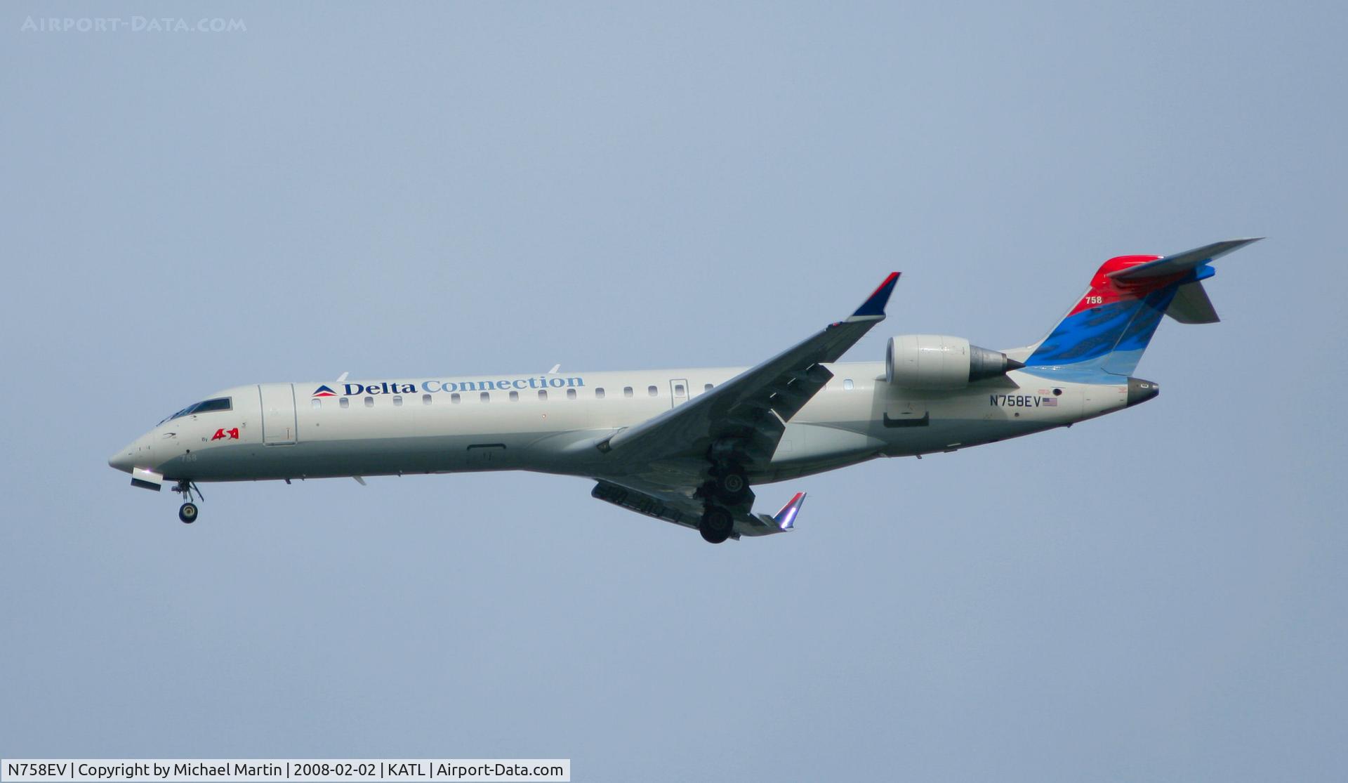 N758EV, 2005 Bombardier CRJ-700 (CL-600-2C10) Regional Jet C/N 10210, On final for Runway 26R
