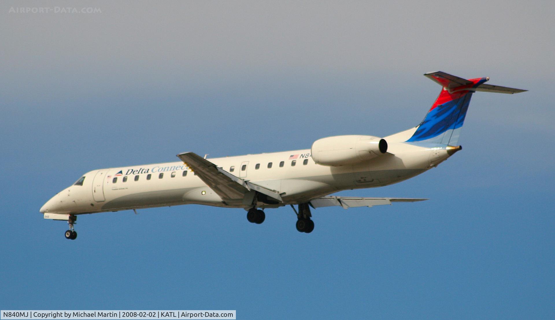 N840MJ, 2001 Embraer ERJ-145LR (EMB-145LR) C/N 145429, Over the numbers of 26R