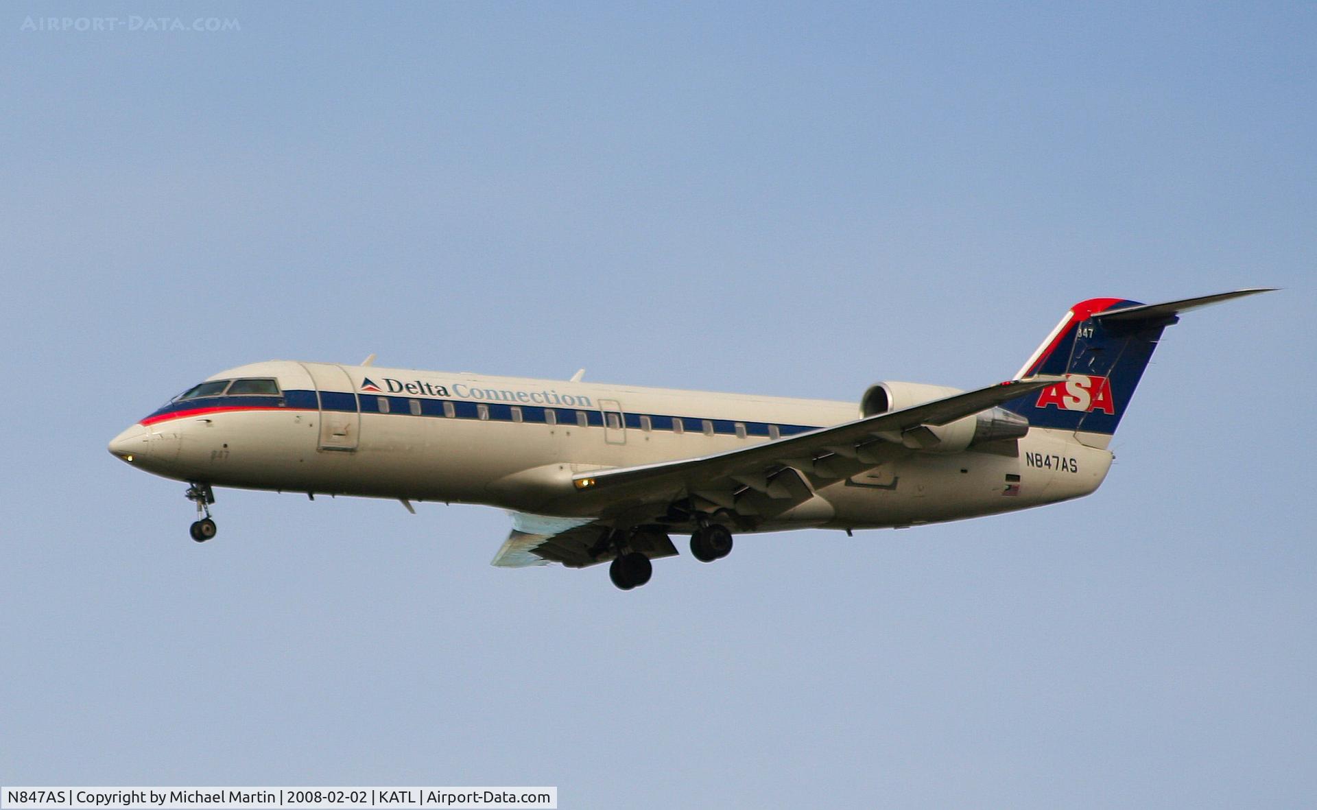 N847AS, 1999 Bombardier CRJ-200ER (CL-600-2B19) C/N 7335, On final for Runway 26R