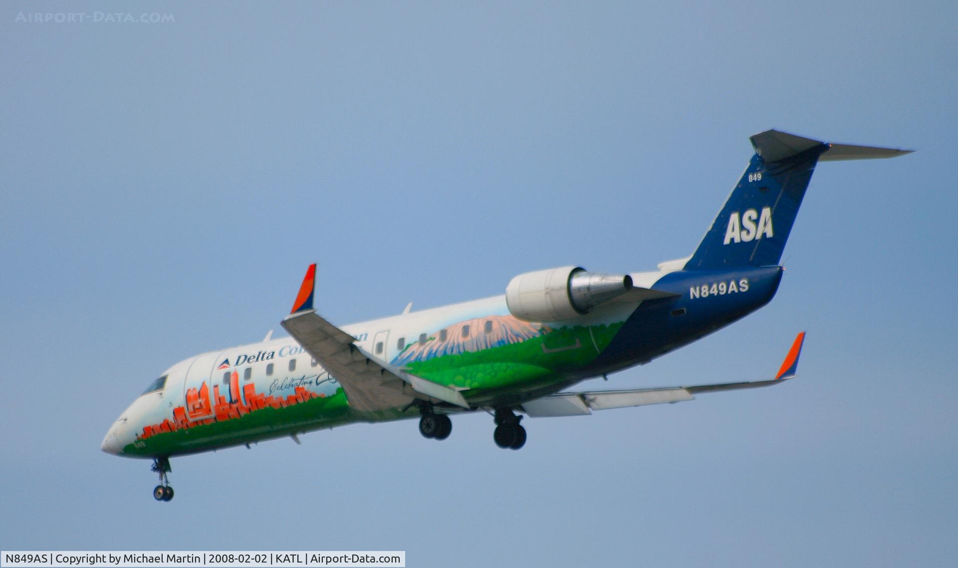 N849AS, 1999 Bombardier CRJ-200ER (CL-600-2B19) C/N 7347, Over the numbers of 26R