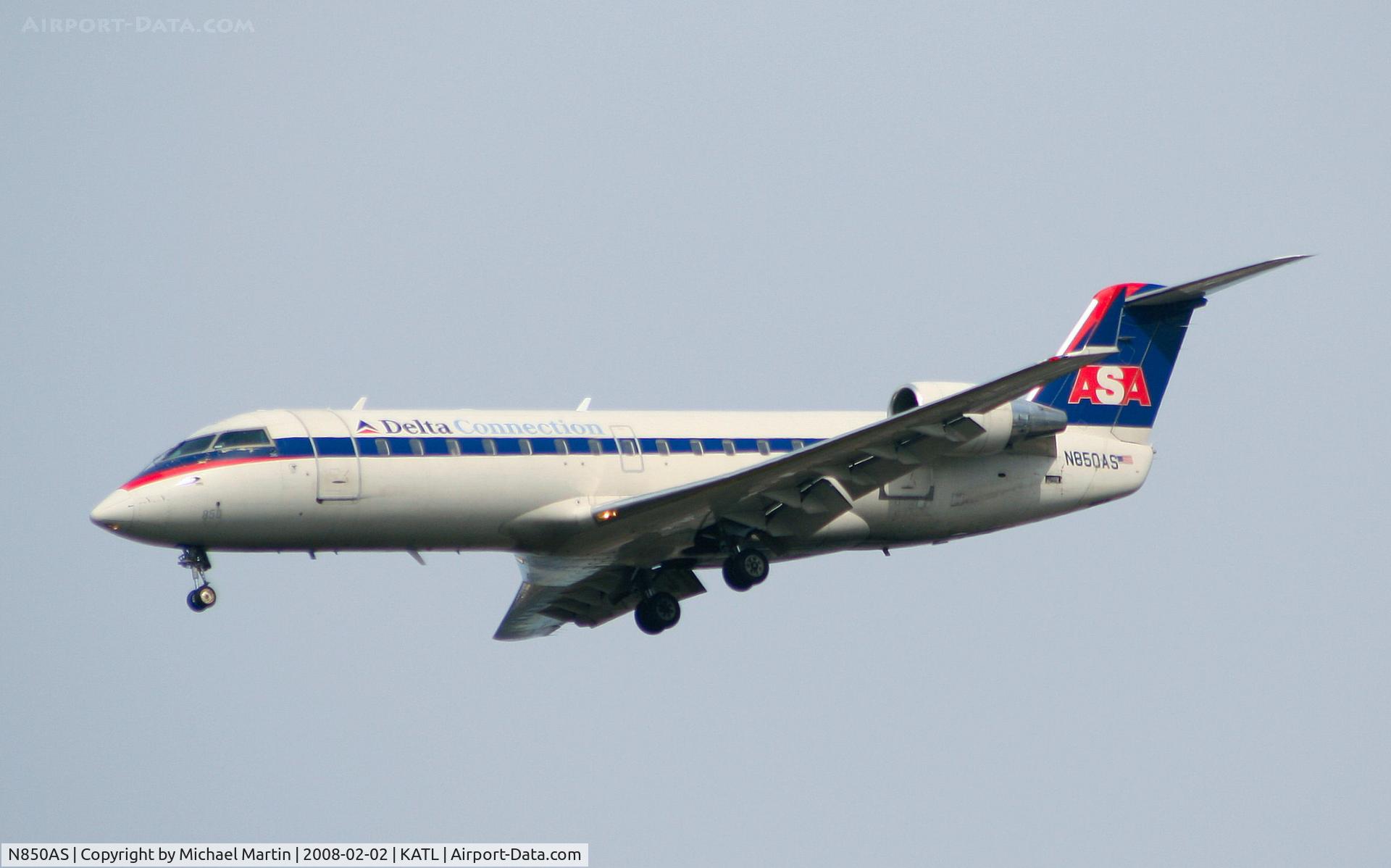 N850AS, 1999 Bombardier CRJ-200ER (CL-600-2B19) C/N 7355, On final for Runway 26R