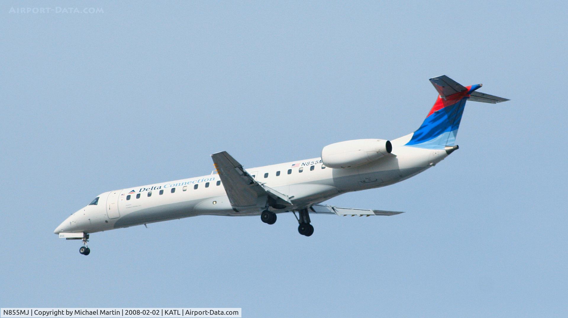 N855MJ, 2002 Embraer ERJ-145LR (EMB-145LR) C/N 145614, Over the numbers of 26R