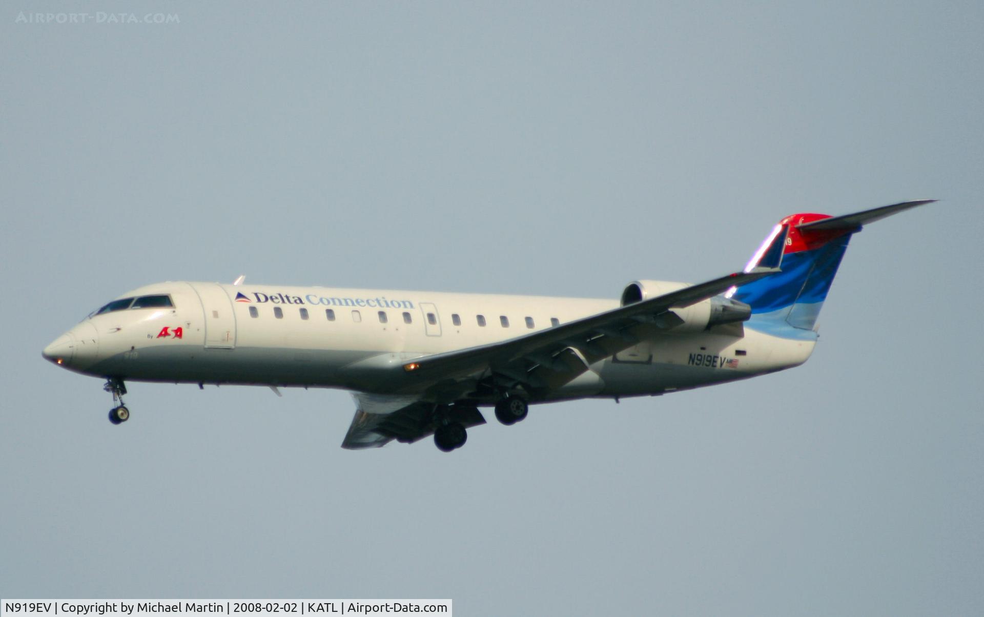 N919EV, 2003 Bombardier CRJ-200ER (CL-600-2B19) C/N 7780, On final for Runway 26R