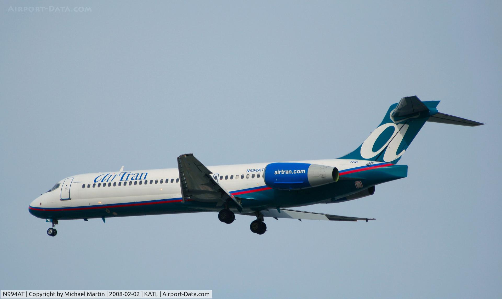 N994AT, 2002 Boeing 717-200 C/N 55138, Over the numbers of 26R