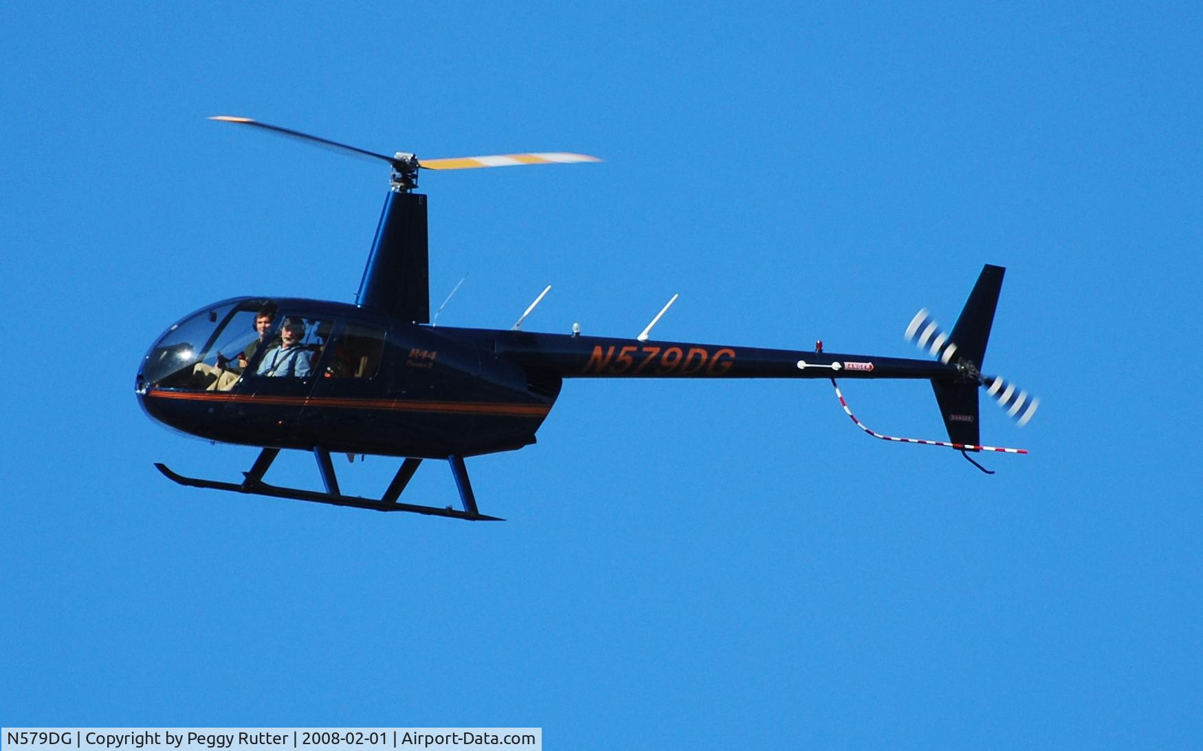 N579DG, 2007 Robinson R44 II C/N 11717, Flying over square in Cleveland, Georgia