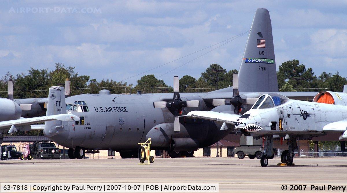 63-7818, 1963 Lockheed C-130E-LM Hercules C/N 382-3884, Looks like the Warthogs are guarding the Hercs