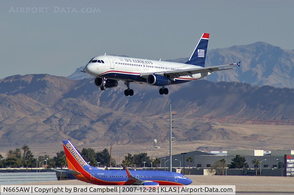 N665AW, 2001 Airbus A320-232 C/N 1644, US Airways / 2001 Airbus Industrie A320-232 / This landing prompted all McCarran's Emergency Vehicles to stand-by. No mishap occured.