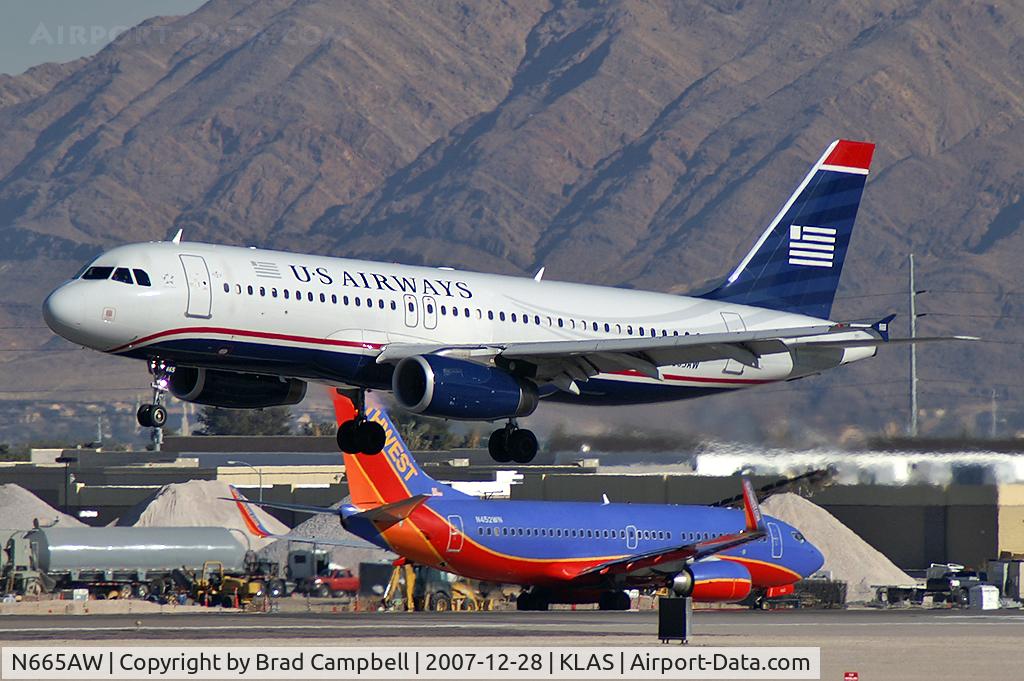 N665AW, 2001 Airbus A320-232 C/N 1644, US Airways / 2001 Airbus Industrie A320-232 / This landing prompted all McCarran's Emergency Vehicles to stand-by. No mishap occured.