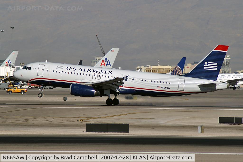 N665AW, 2001 Airbus A320-232 C/N 1644, US Airways / 2001 Airbus Industrie A320-232 / This landing prompted all McCarran's Emergency Vehicles to stand-by. No mishap occured.