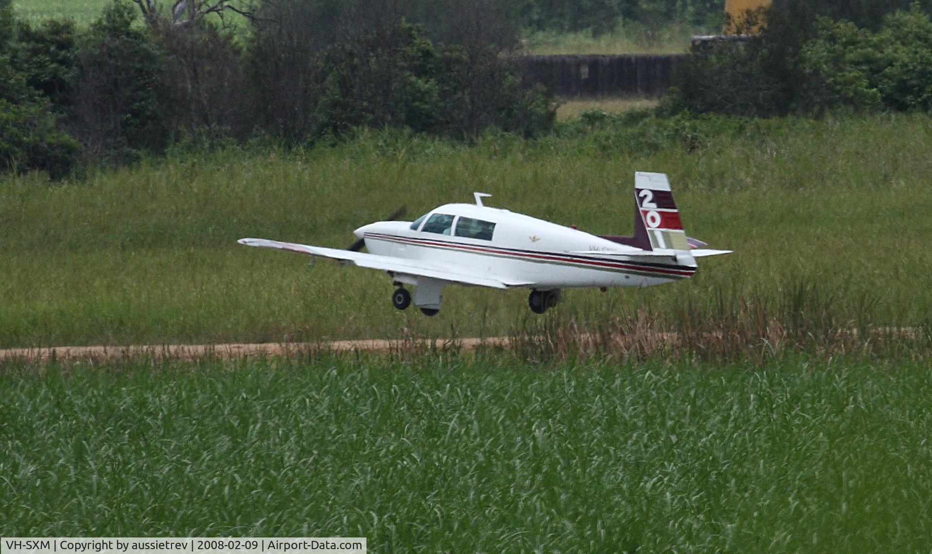 VH-SXM, 1976 Mooney M20J 201 C/N 24-0039, Taking ofF from Hecks Field on the East West runway