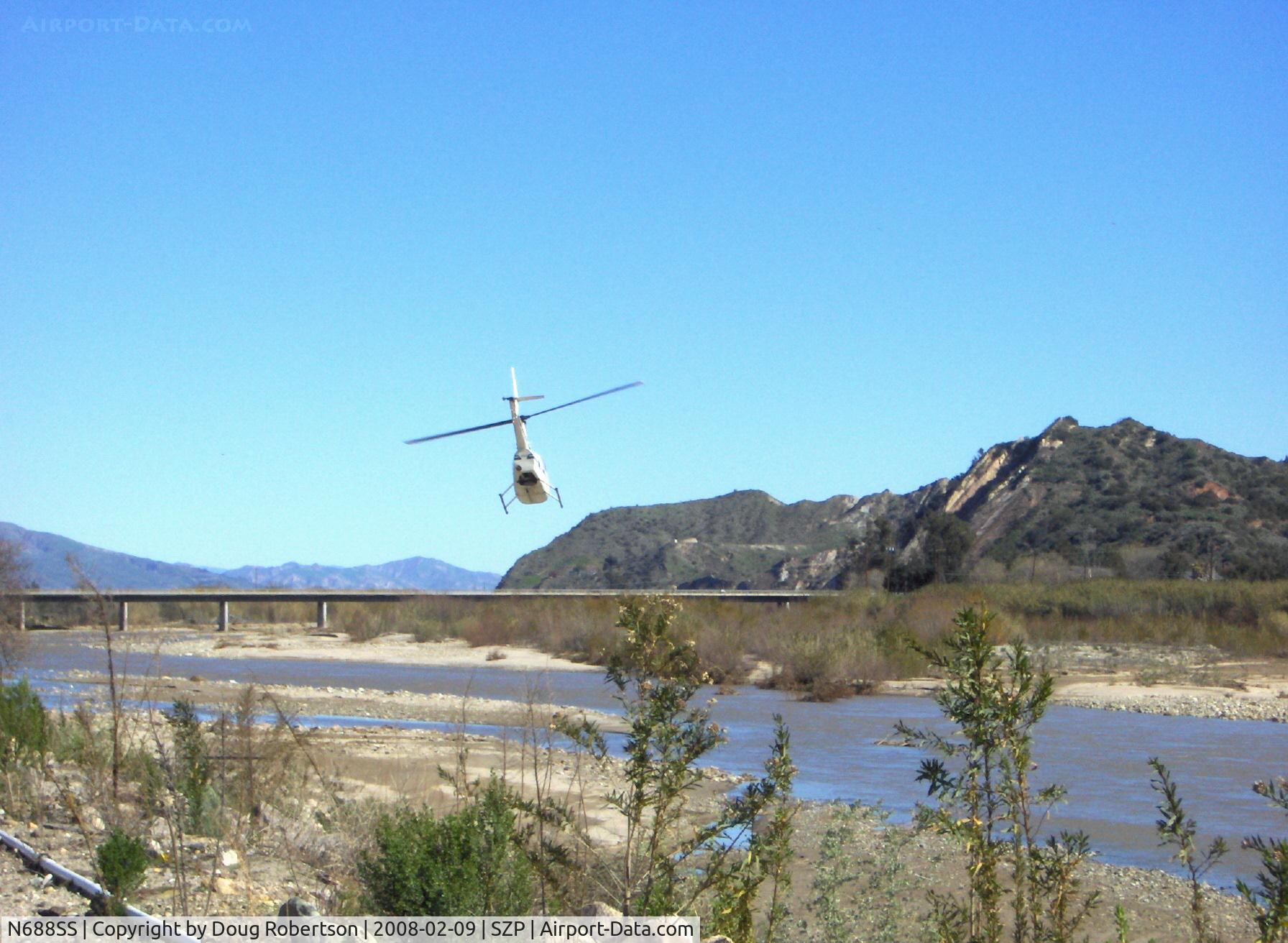 N688SS, 2000 Robinson R44 Raven C/N 0861, 2000 Robinson R44 RAVEN, Lycoming O-540 260 Hp derated to 225 Hp at takeoff, 205 Hp continuous, takeoff departure up the Santa Clara Riverbed