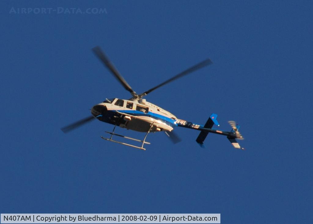 N407AM, 1998 Bell 407 C/N 53309, Flyover of Columbine High School.