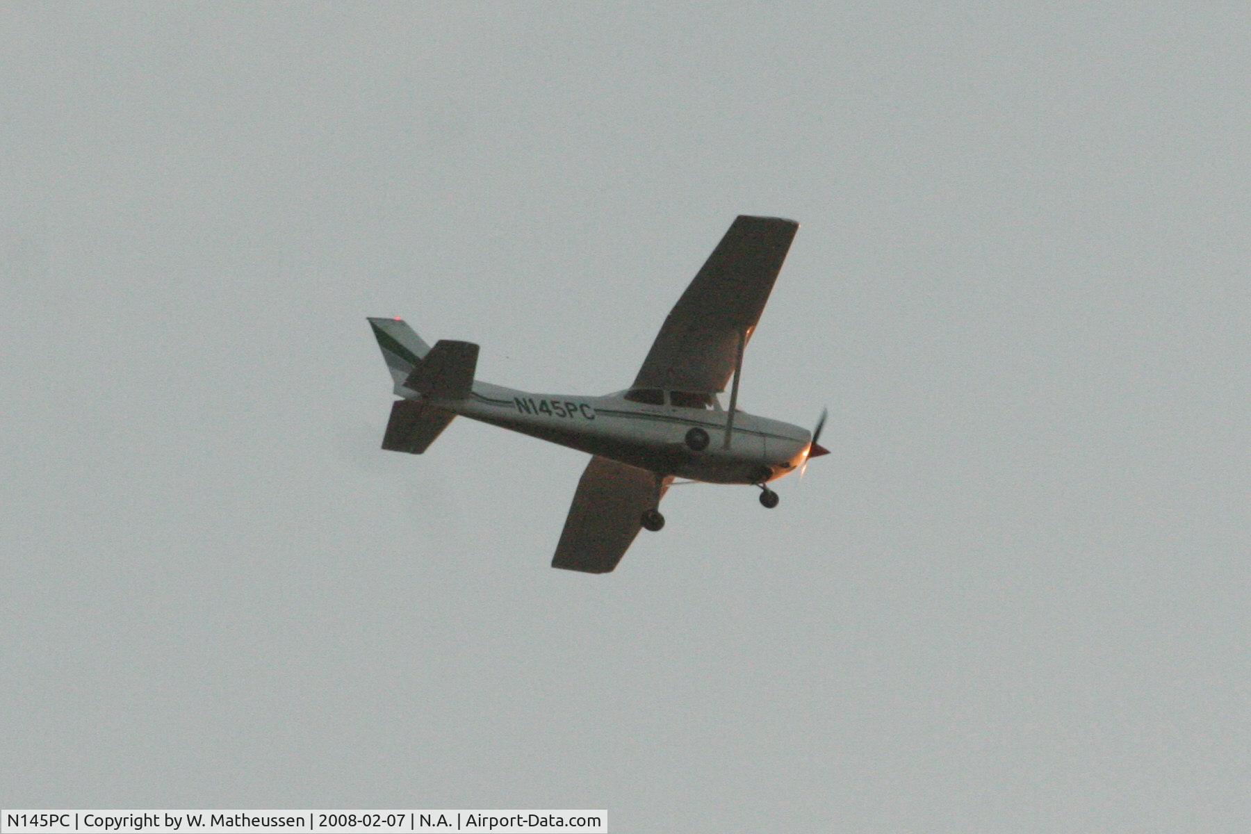N145PC, 1973 Reims FR172J Reims Rocket C/N 0383, passing Herentals Belgium, late afternoon, zoom lens at 180mm with 2x extender, manual focus