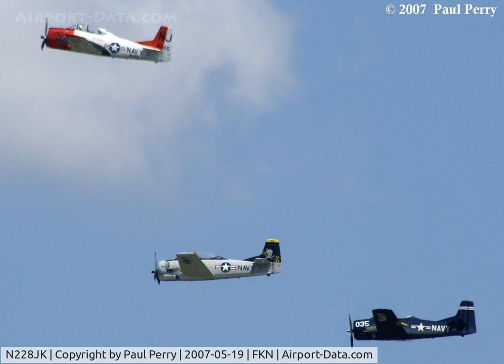 N228JK, 1955 North American T-28B Trojan C/N 200-31 (137668), With 090 up and out, the Jolly Roger has the lead