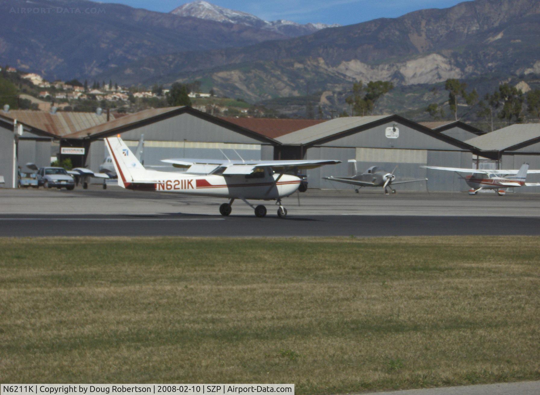 N6211K, 1975 Cessna 150M C/N 15077588, 1975 Cessna 150M, Continental O-200 100 Hp, landing roll Rwy 04