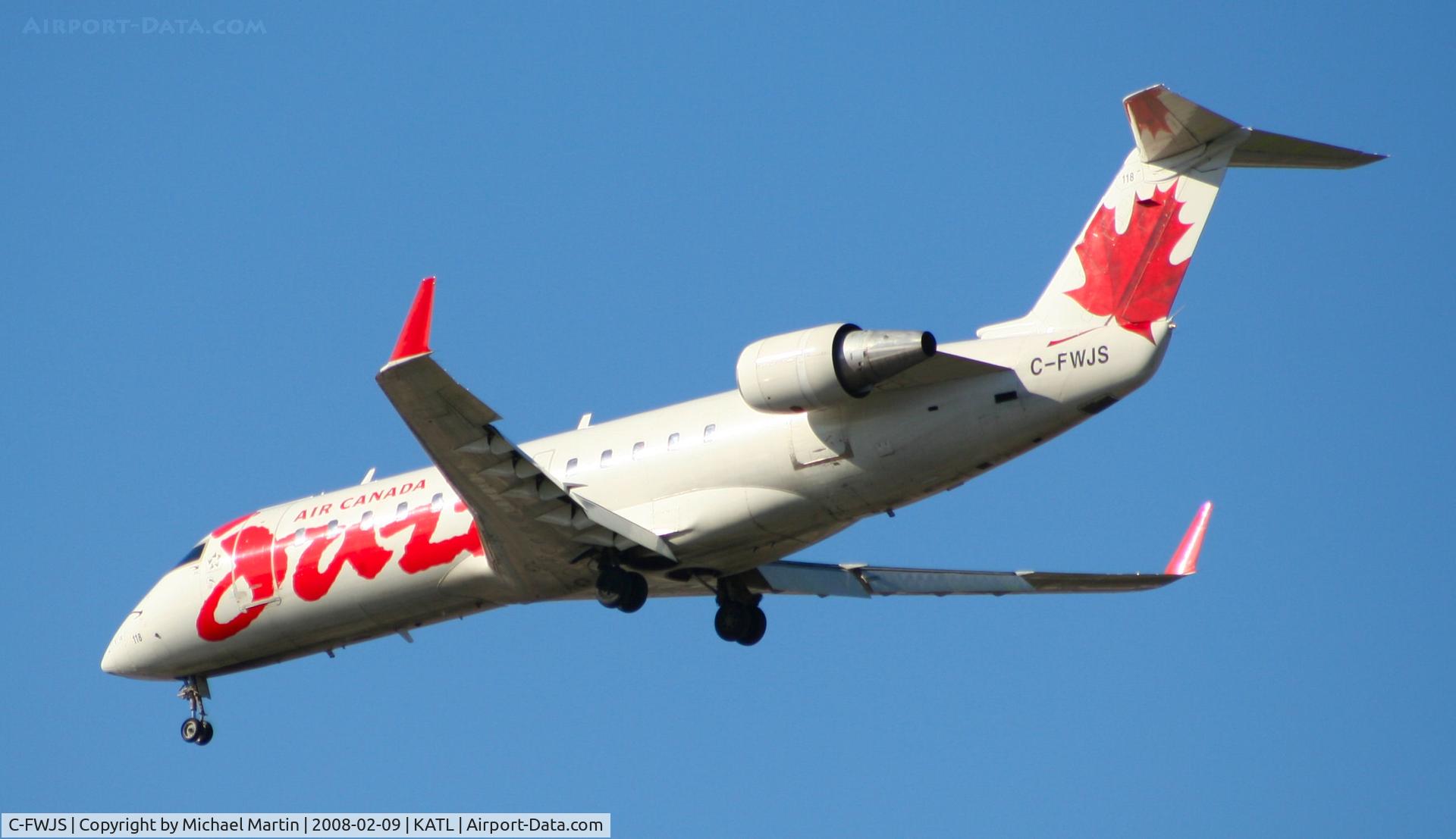 C-FWJS, 1995 Canadair CRJ-100ER (CL-600-2B19) C/N 7097, Short Final for 26R