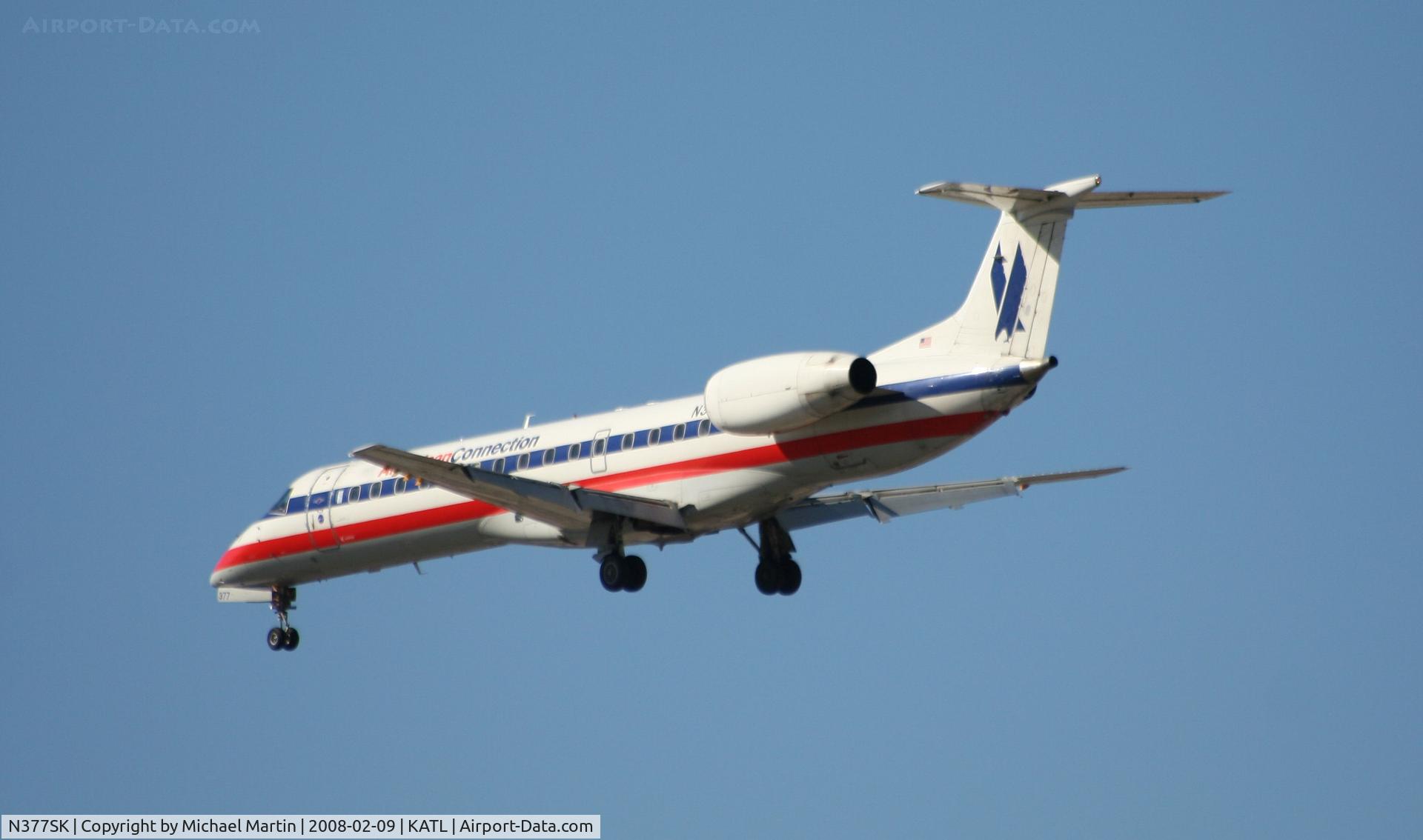 N377SK, 2002 Embraer ERJ-140LR (EMB-135KL) C/N 145579, Short Final for 26R