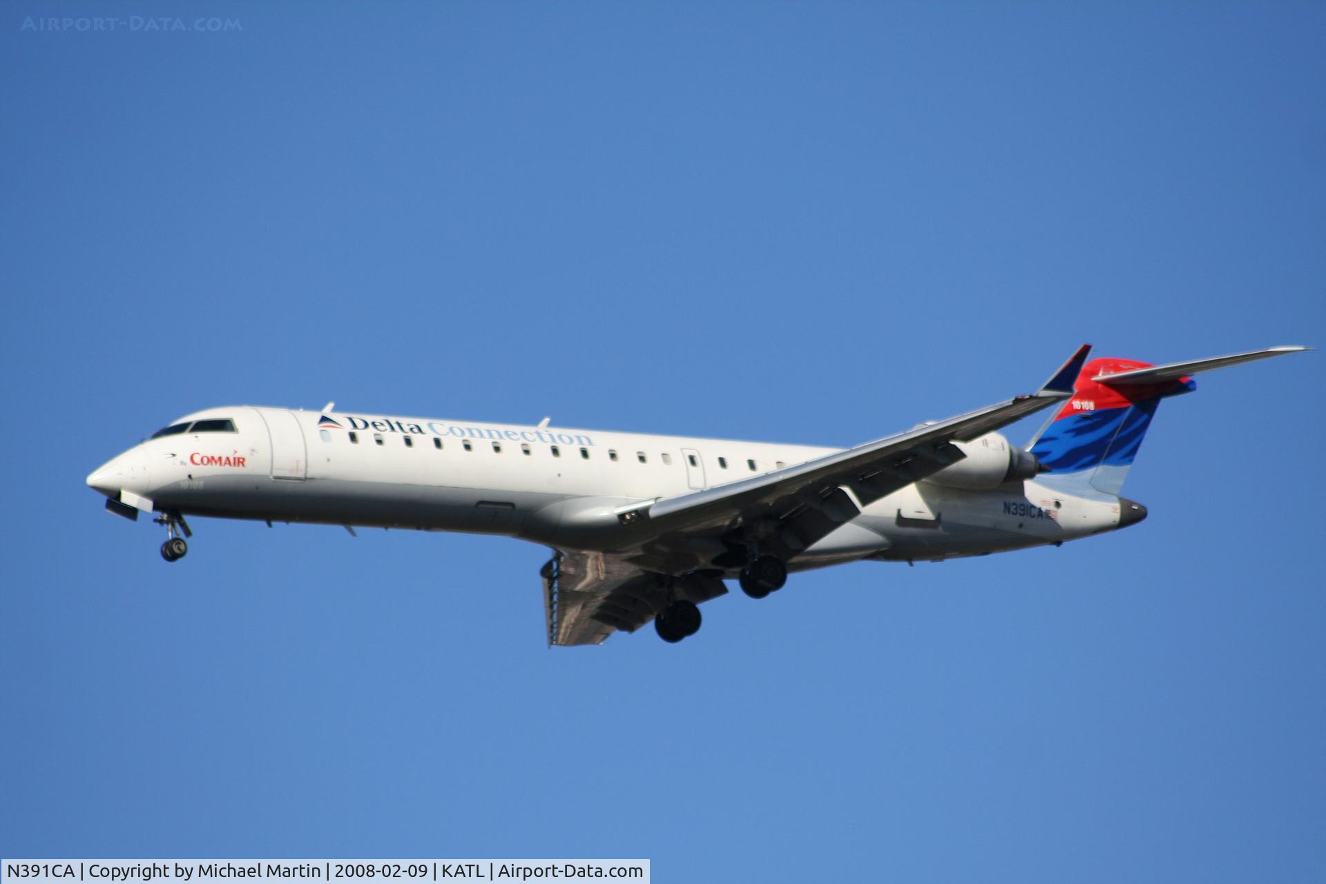 N391CA, 2003 Bombardier CRJ-701ER (CL-600-2C10) Regional Jet C/N 10108, On final for Runway 26R