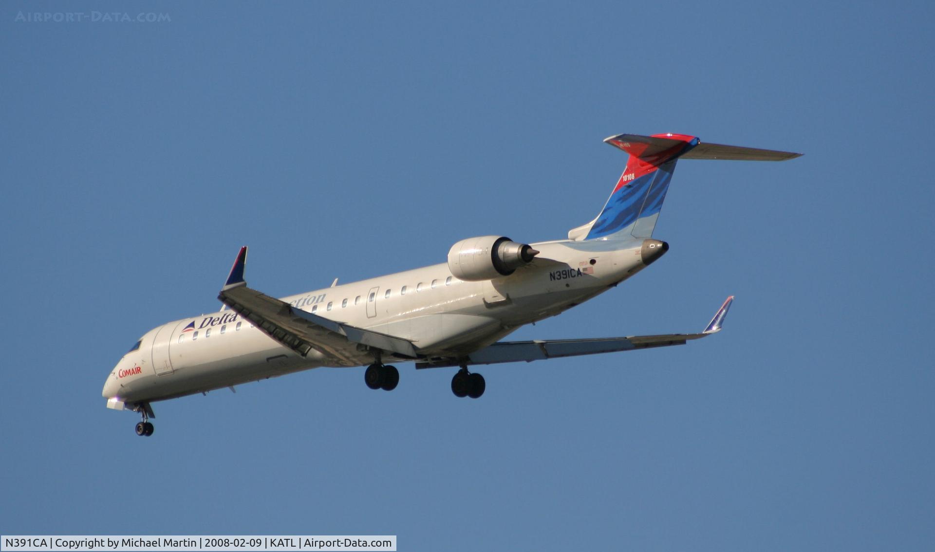 N391CA, 2003 Bombardier CRJ-701ER (CL-600-2C10) Regional Jet C/N 10108, Short Final for 26R