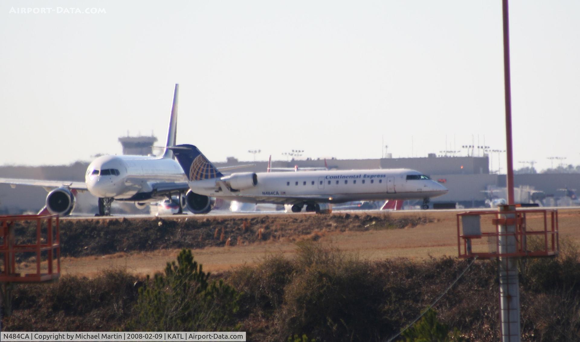 N484CA, 2002 Bombardier CRJ-200ER (CL-600-2B19) C/N 7702, Number one for Runway 26L