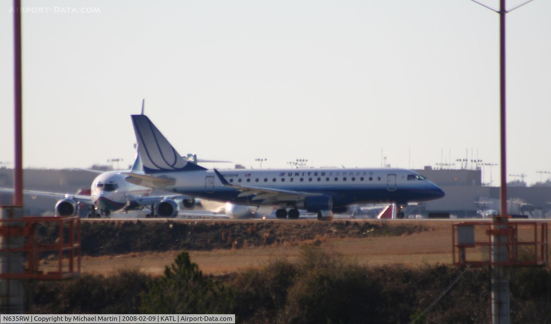 N635RW, 2004 Embraer 170SE (ERJ-170-100SE) C/N 17000056, Number one for Runway 26L