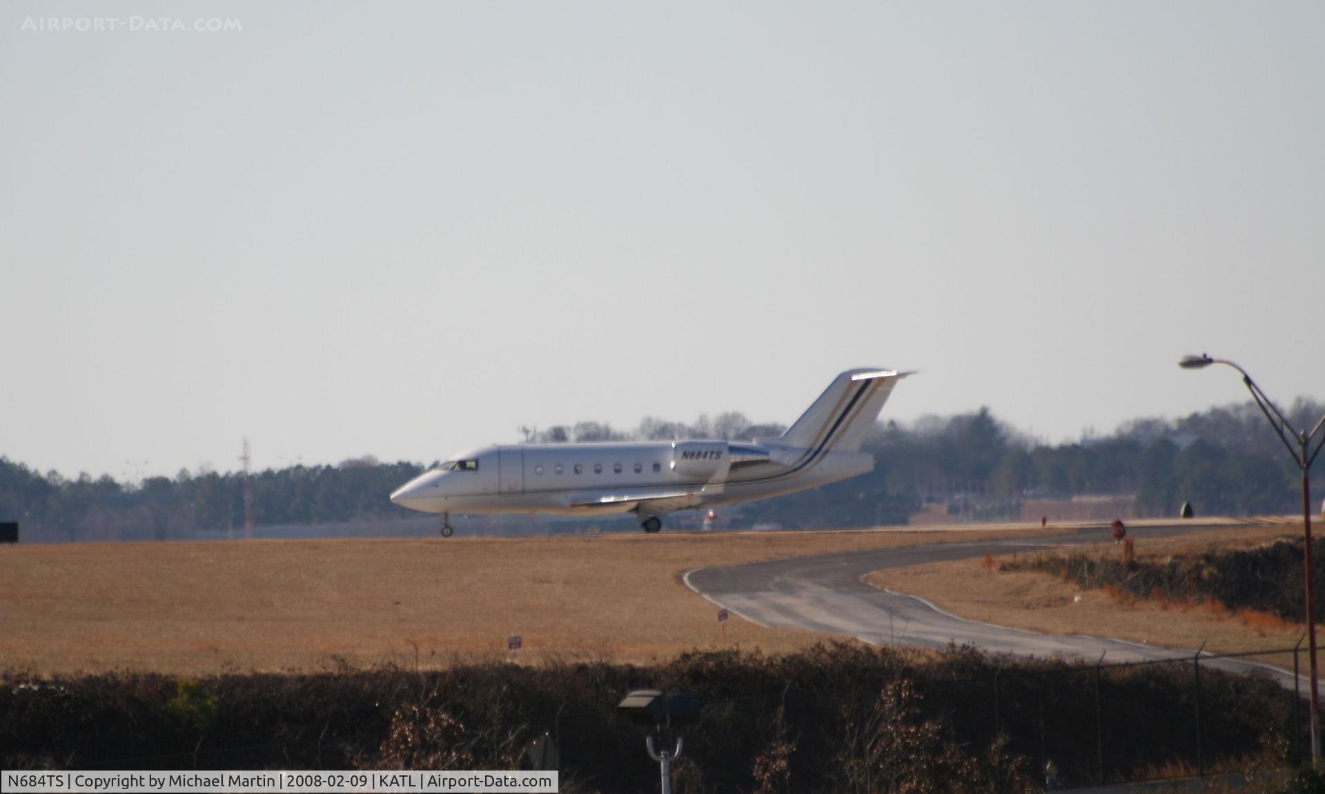 N684TS, 1998 Bombardier Challenger 604 (CL-600-2B16) C/N 5384, Number one for Runway 26L