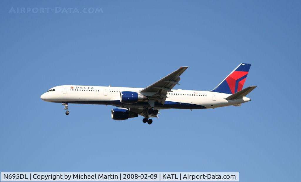N695DL, 1998 Boeing 757-232 C/N 29727, On final for Runway 26R
