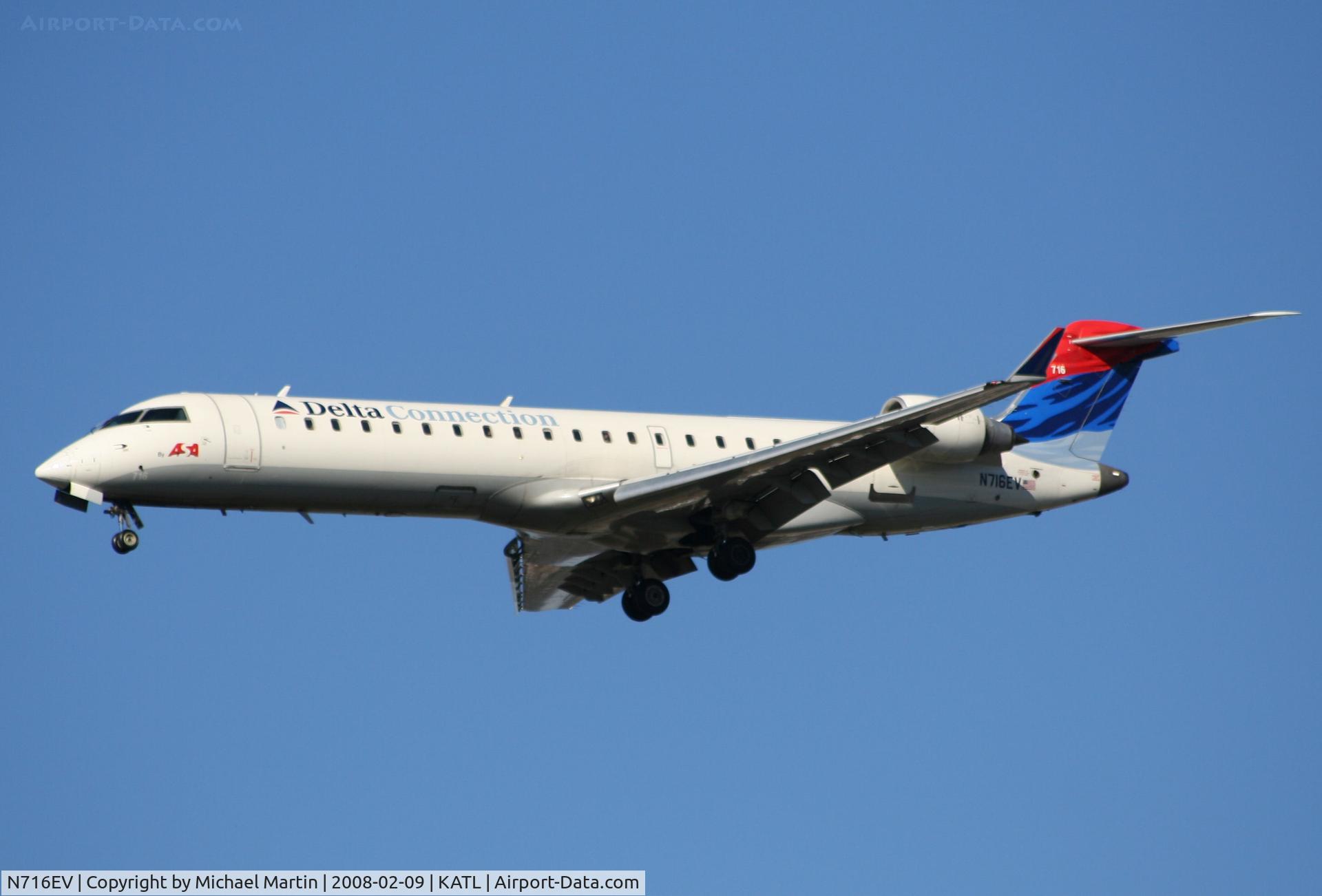 N716EV, 2003 Bombardier CRJ-701 (CL-600-2C10) Regional Jet C/N 10084, On final for Runway 26R