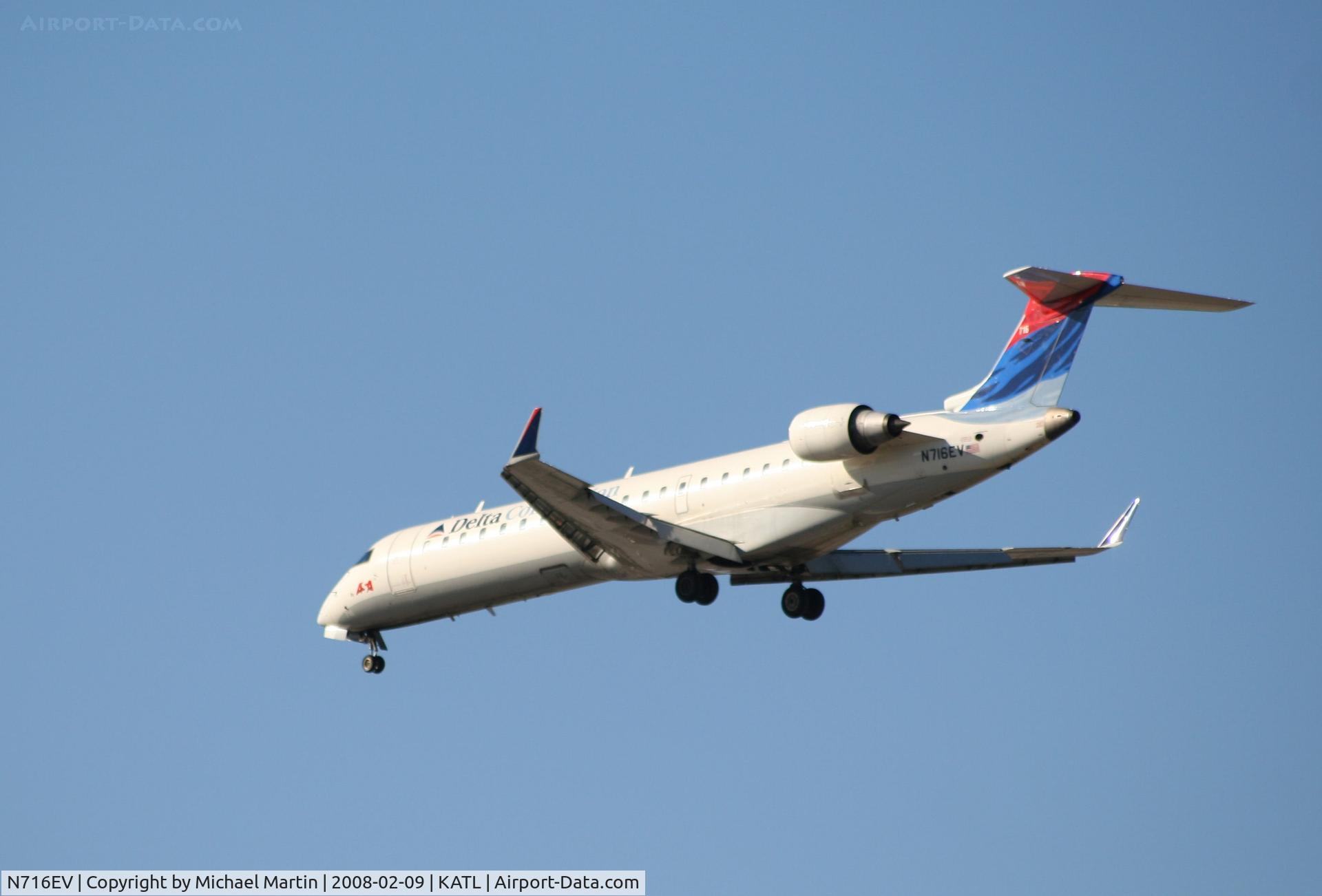 N716EV, 2003 Bombardier CRJ-701 (CL-600-2C10) Regional Jet C/N 10084, Short Final for 26R