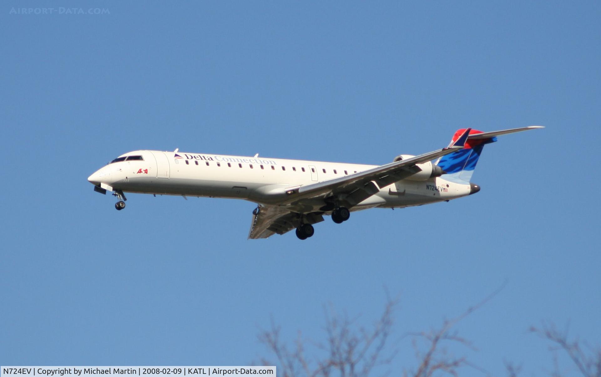 N724EV, 2004 Bombardier CRJ-701 (CL-600-2C10) Regional Jet C/N 10138, On final for Runway 26R