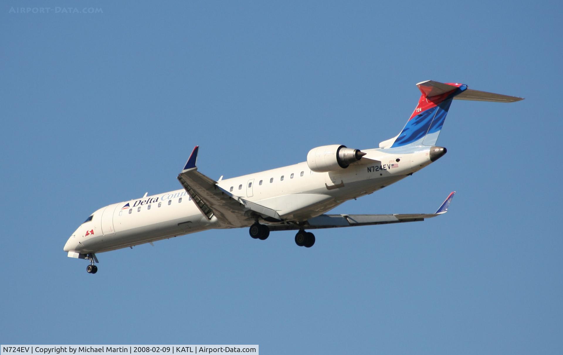 N724EV, 2004 Bombardier CRJ-701 (CL-600-2C10) Regional Jet C/N 10138, Short Final for 26R