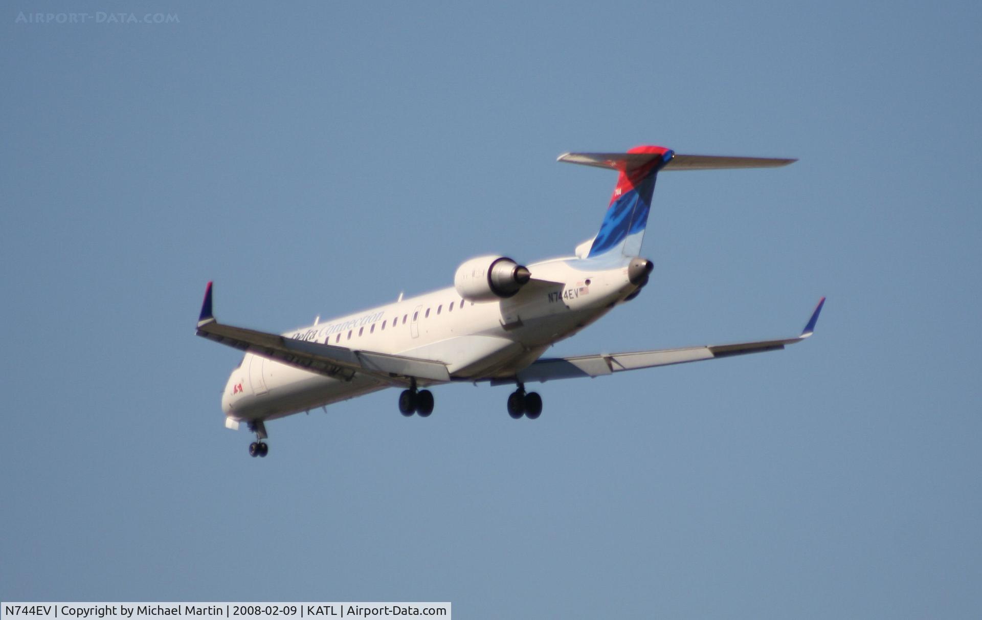 N744EV, 2004 Canadair CRJ-700 (CL-600-2C10) Regional Jet C/N 10157, Short Final for 26R
