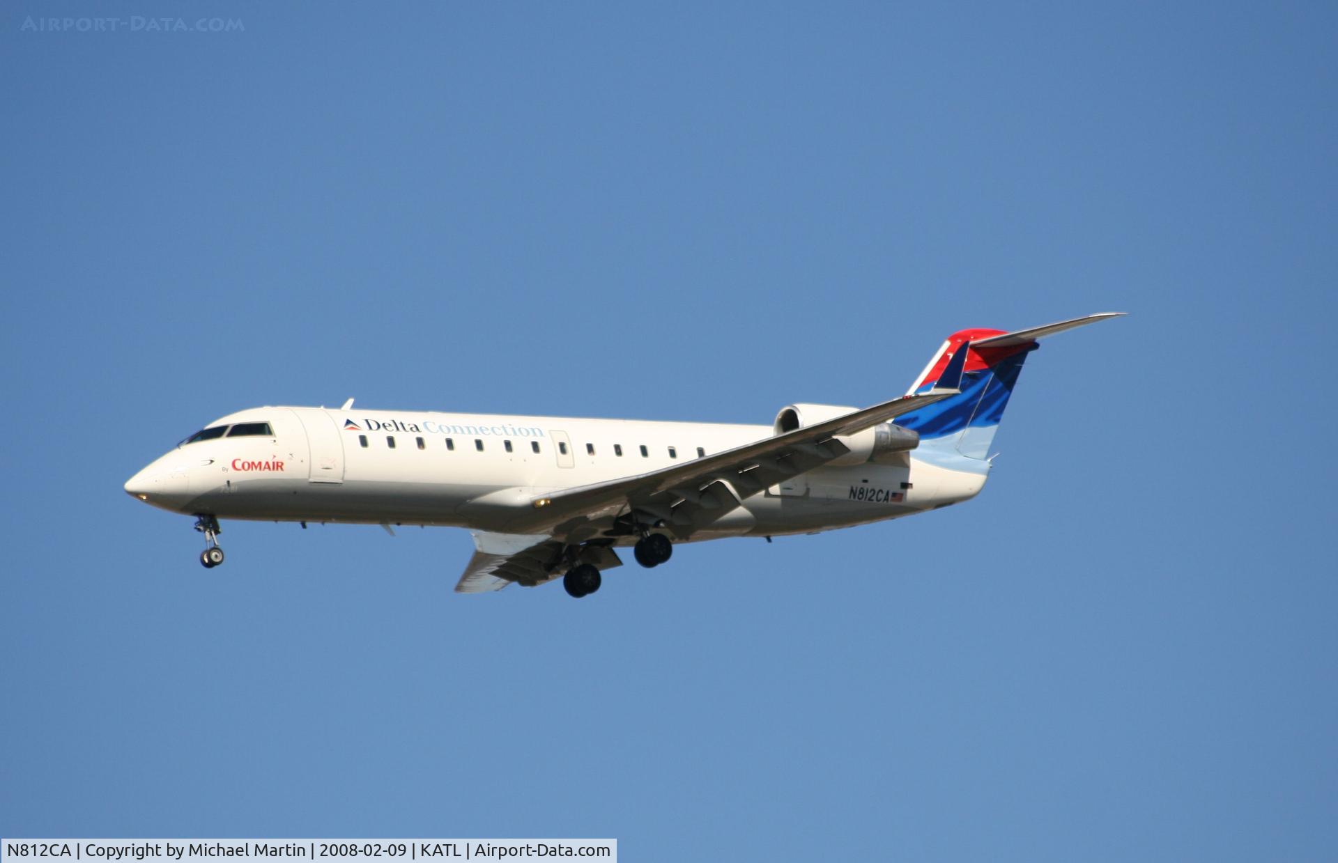 N812CA, 2000 Bombardier CRJ-100ER (CL-600-2B19) C/N 7381, On final for Runway 26R