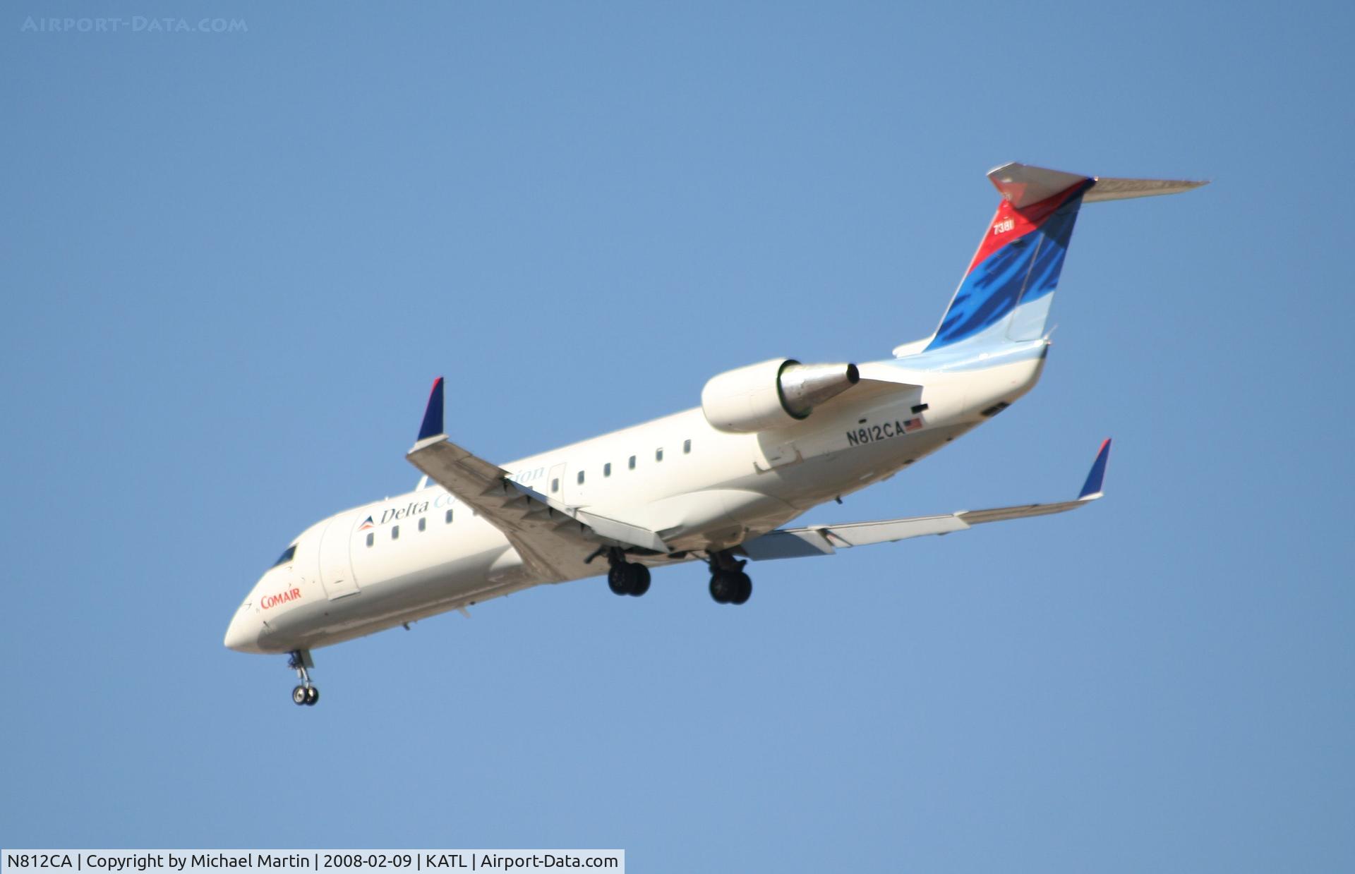 N812CA, 2000 Bombardier CRJ-100ER (CL-600-2B19) C/N 7381, Short Final for 26R